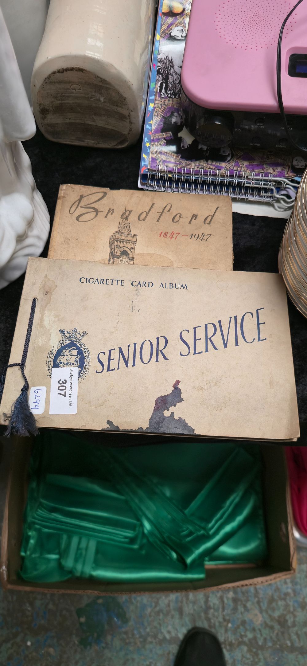 Lot 347: Album containing various train and tram cigarette cards...