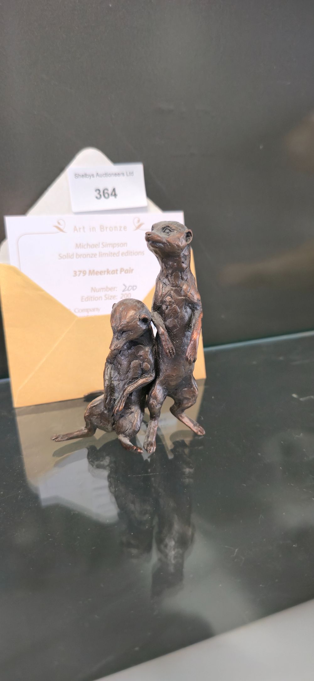Lot 364: Art in bronze, Michael Simpson, meerkat pair, limited-edition,...