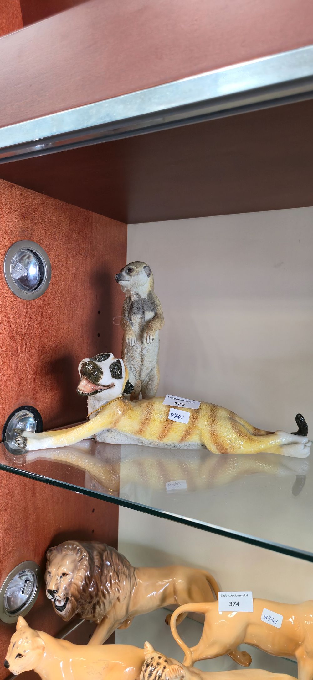 Lot 373: Danbury, mint, pets, personality, meerkat with country artist,meerkat...