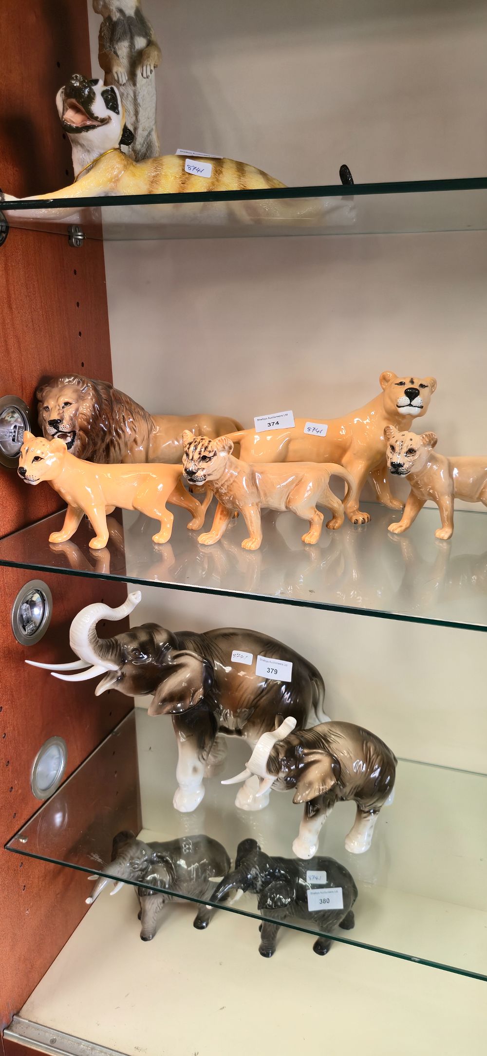 Lot 374: Five Various Bestwick porcelain lion family figurines