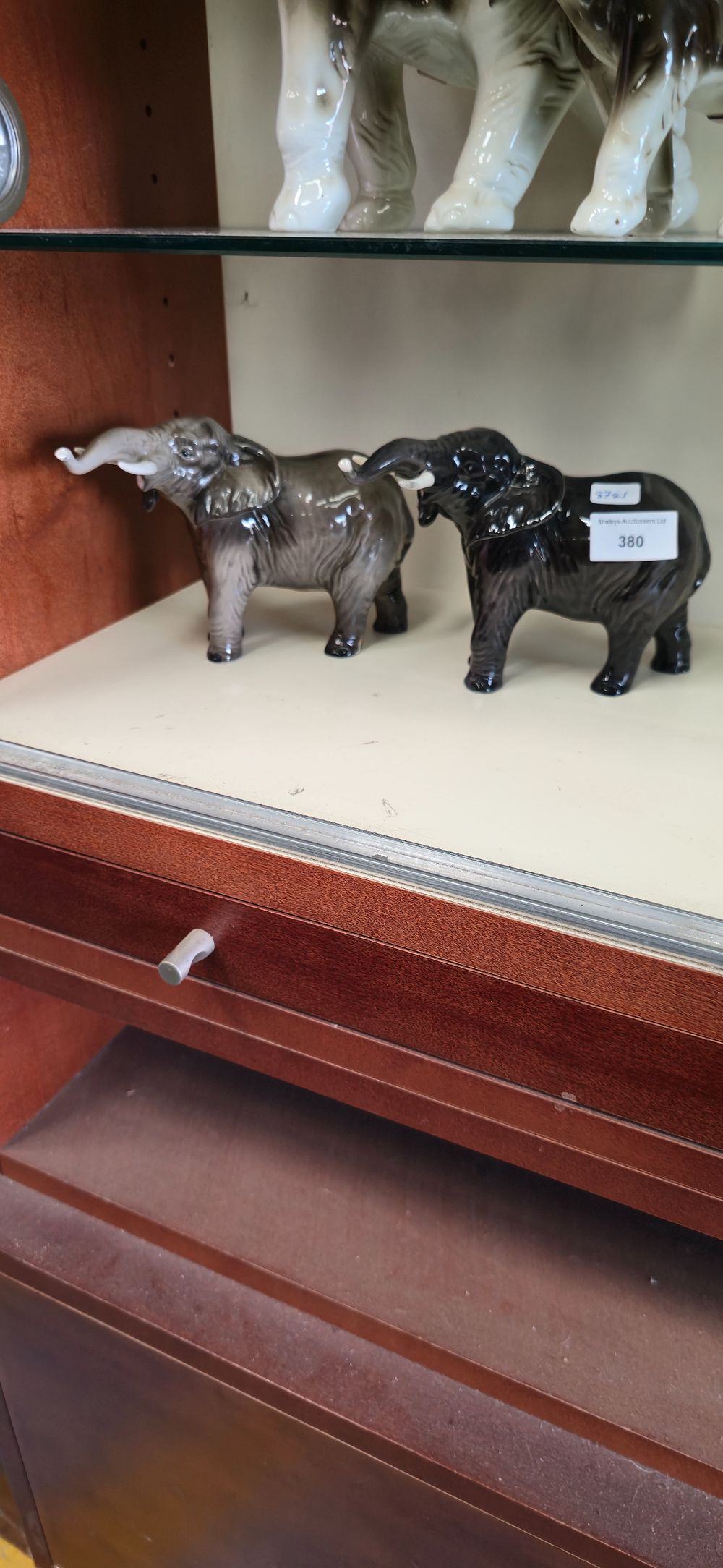 Lot 380: Two beswick Pottery elephant, figurines