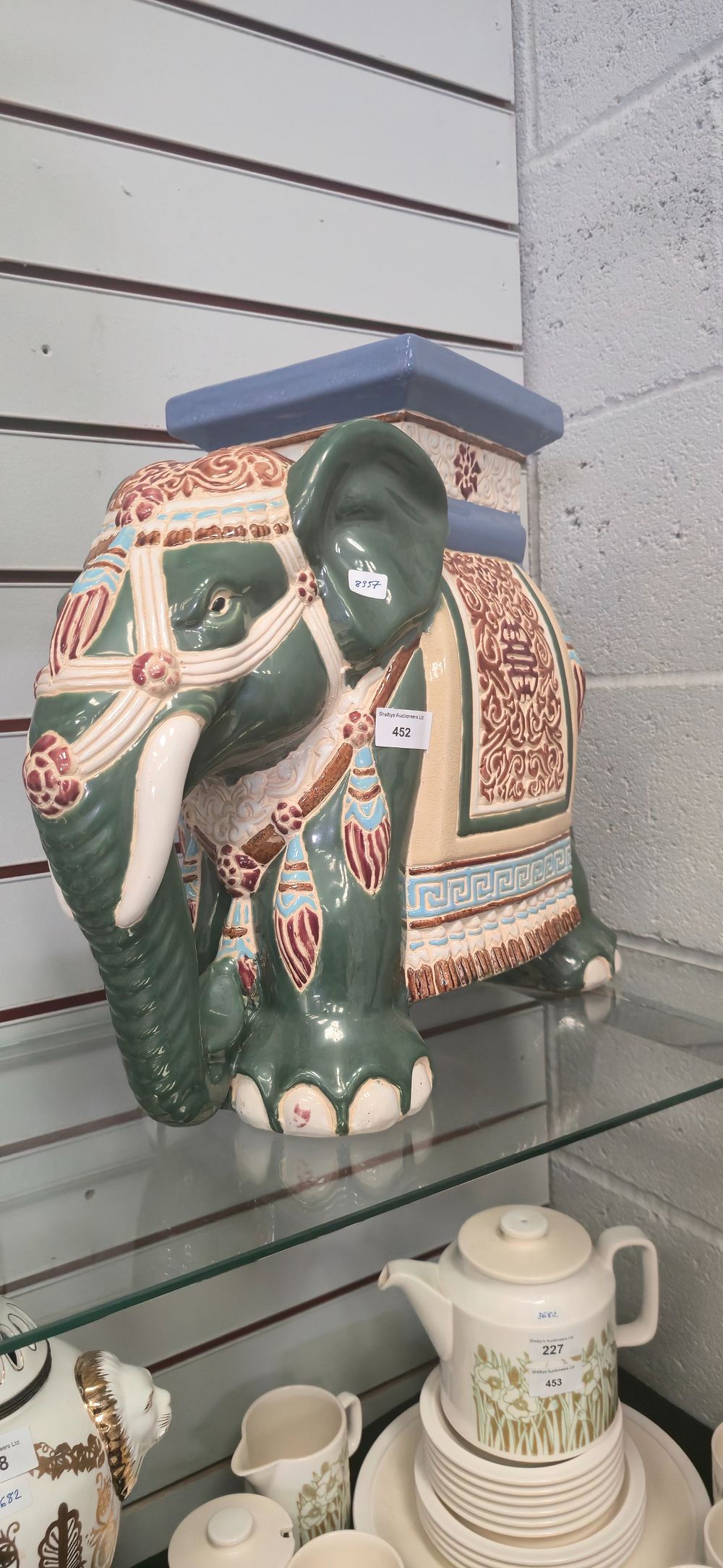 Lot 452: Small reproduction, pottery elephant garden seat