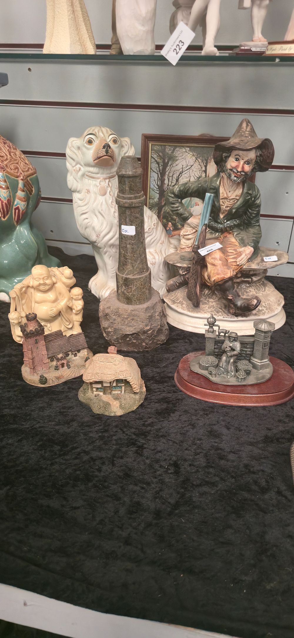 Lot 466: Staffordshire dog with tramp figurine etc