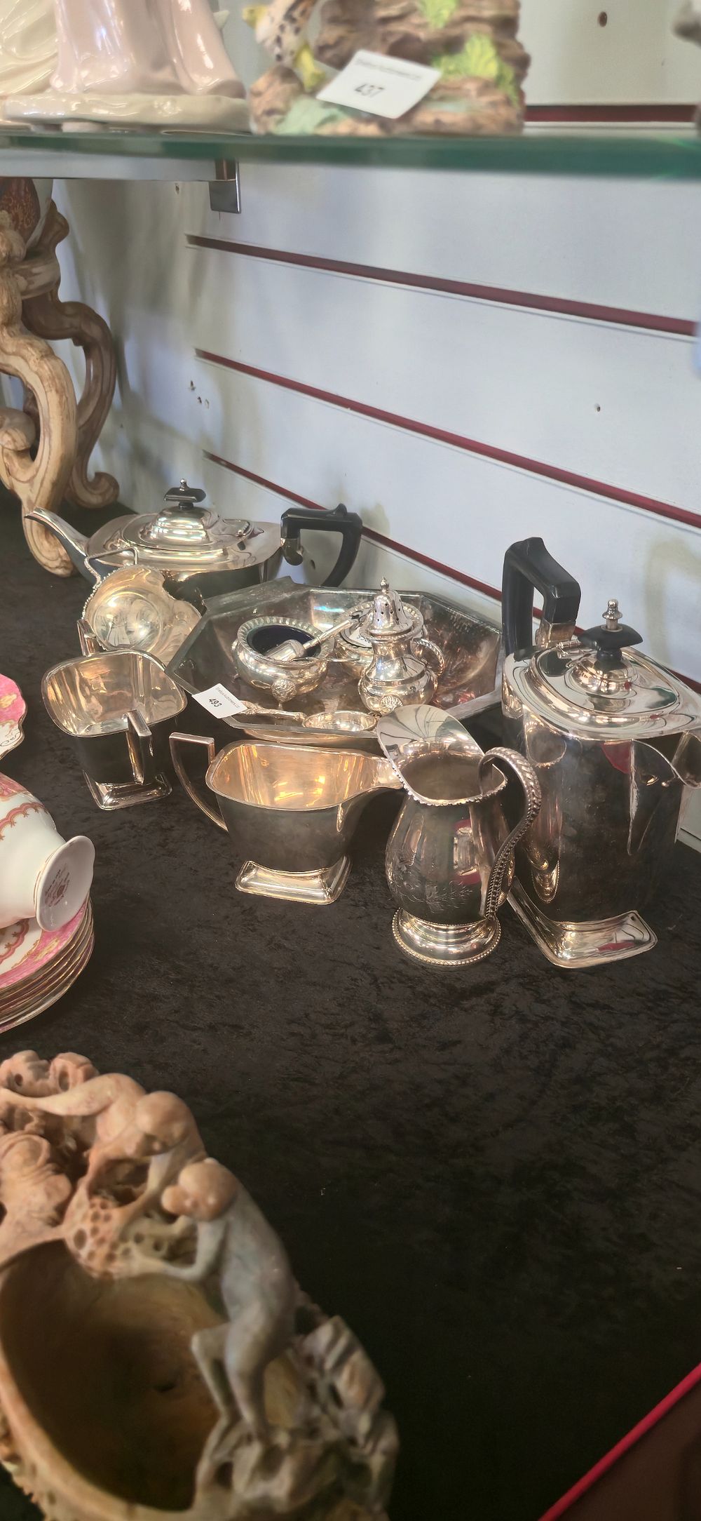 Lot 493: Four-piece plated ware to service with other plated...