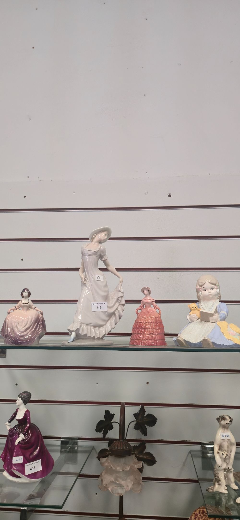 Lot 415: Nao lady figurine with various small figurines