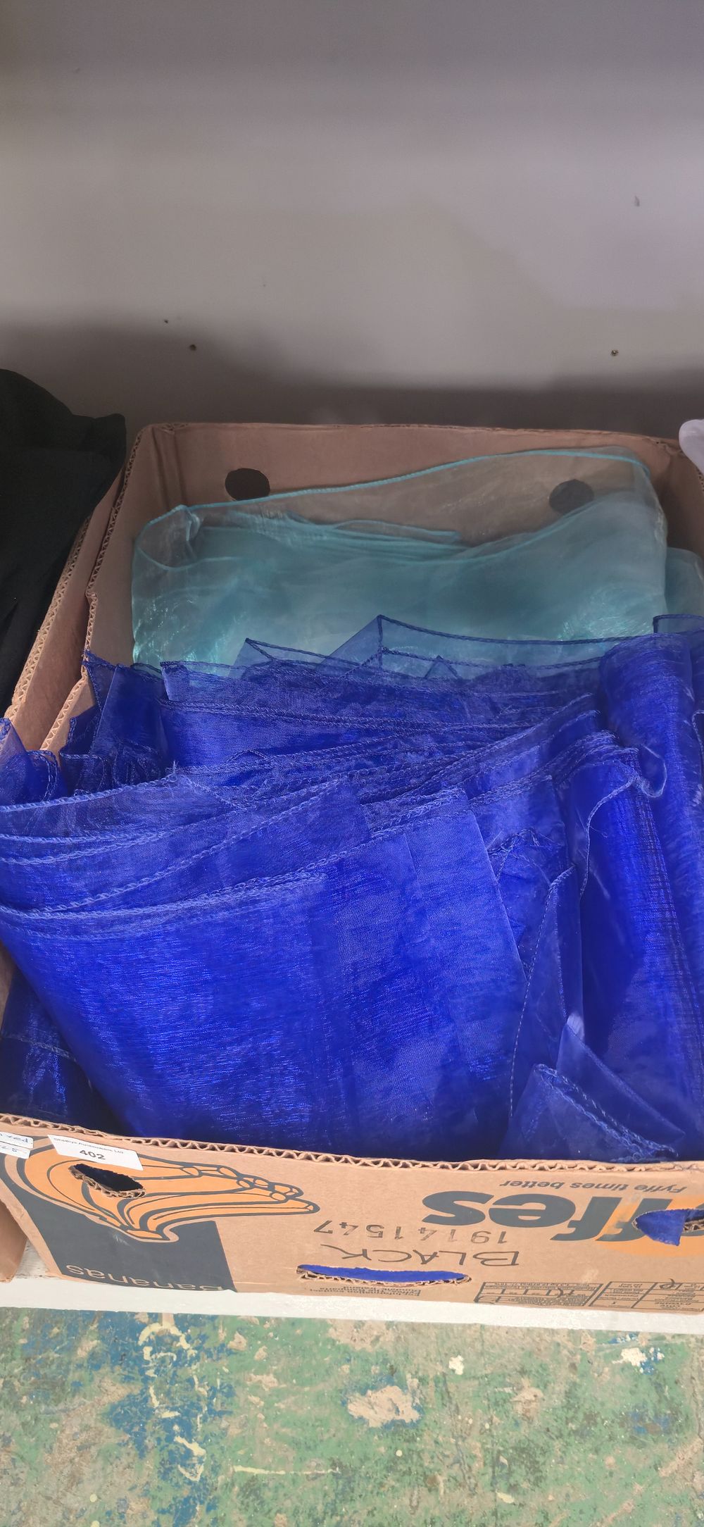 Lot 402: Box containing Royal blue and teal chair tie...