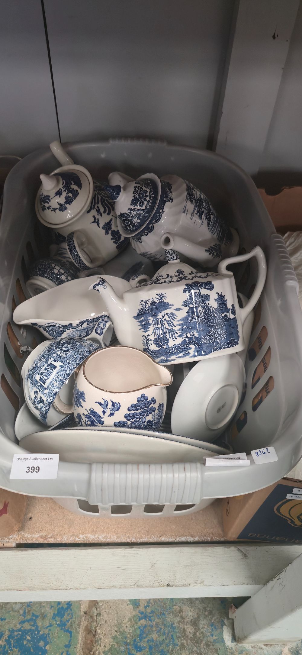 Lot 399: Box containing large amount of blue-and-white, ware pottery...