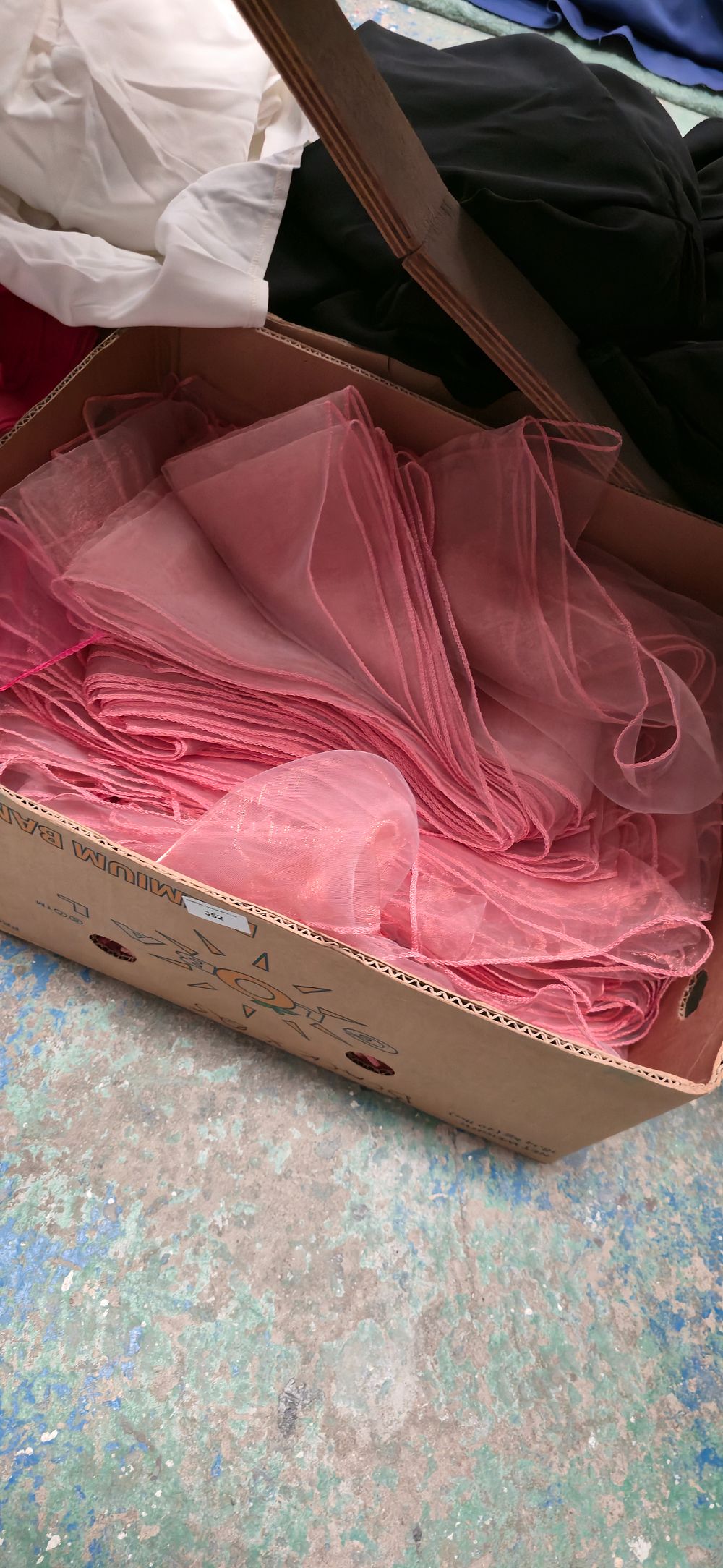 Lot 352: Box containing coral, pink chair, tiebacks