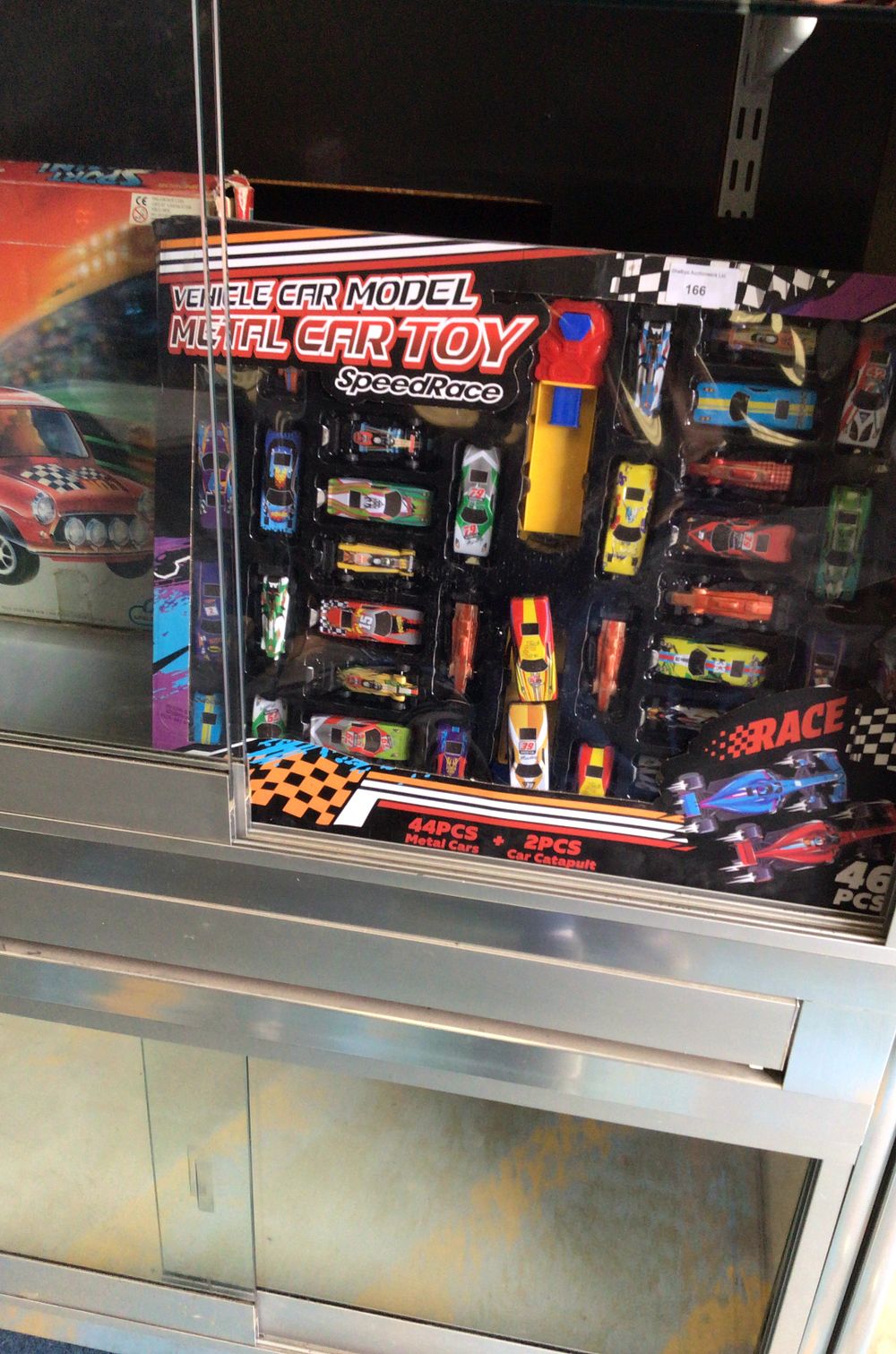 Lot 166: SpeedRace Metal Toy Car and Catapult Set