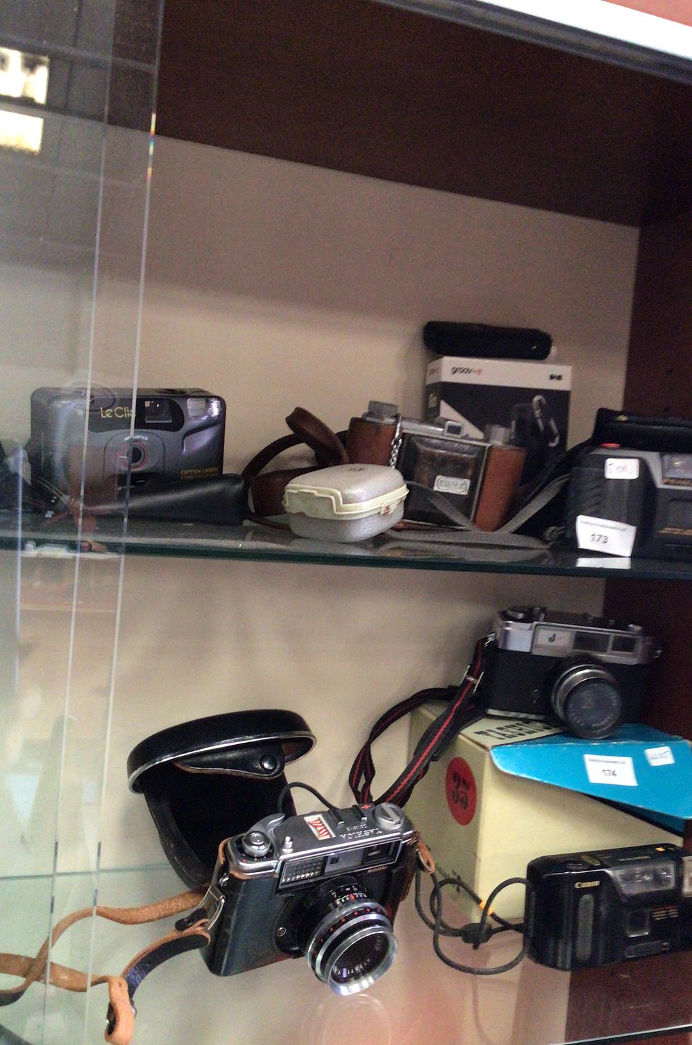 Lot 173: Vintage and Modern Camera Collection with Digital Radio
