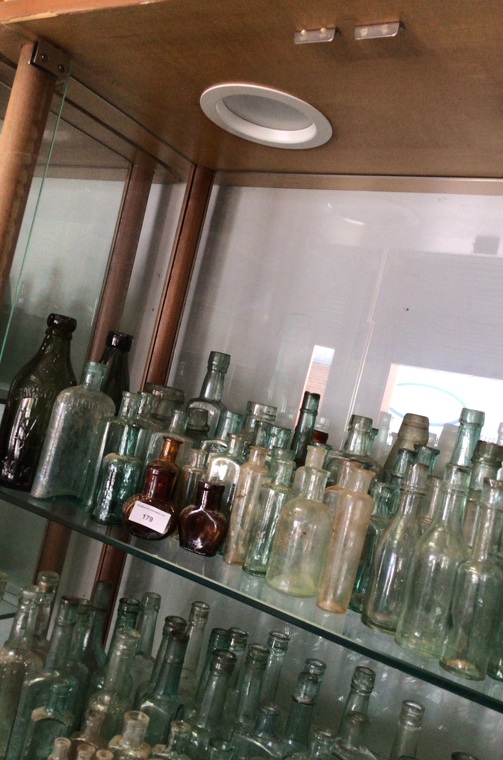 Lot 179: Diverse Collection of Antique Glass Bottles