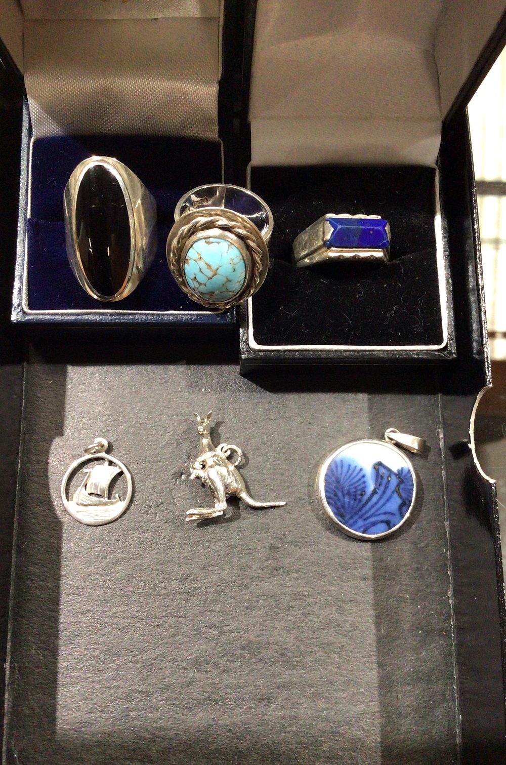 Lot 238: Sterling Silver Rings and Assorted Pendants
