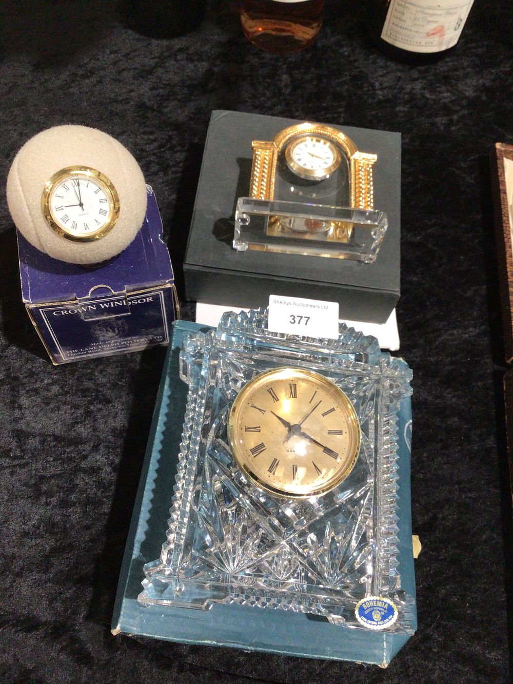 Lot 377: Three Decorative Crystal and Novelty Quartz Clocks