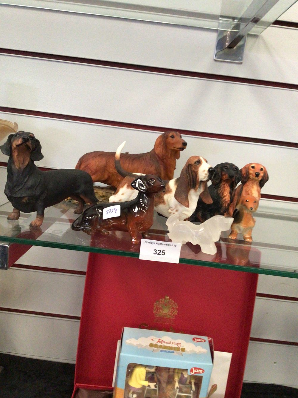 Lot 325: A group of pottery dogs