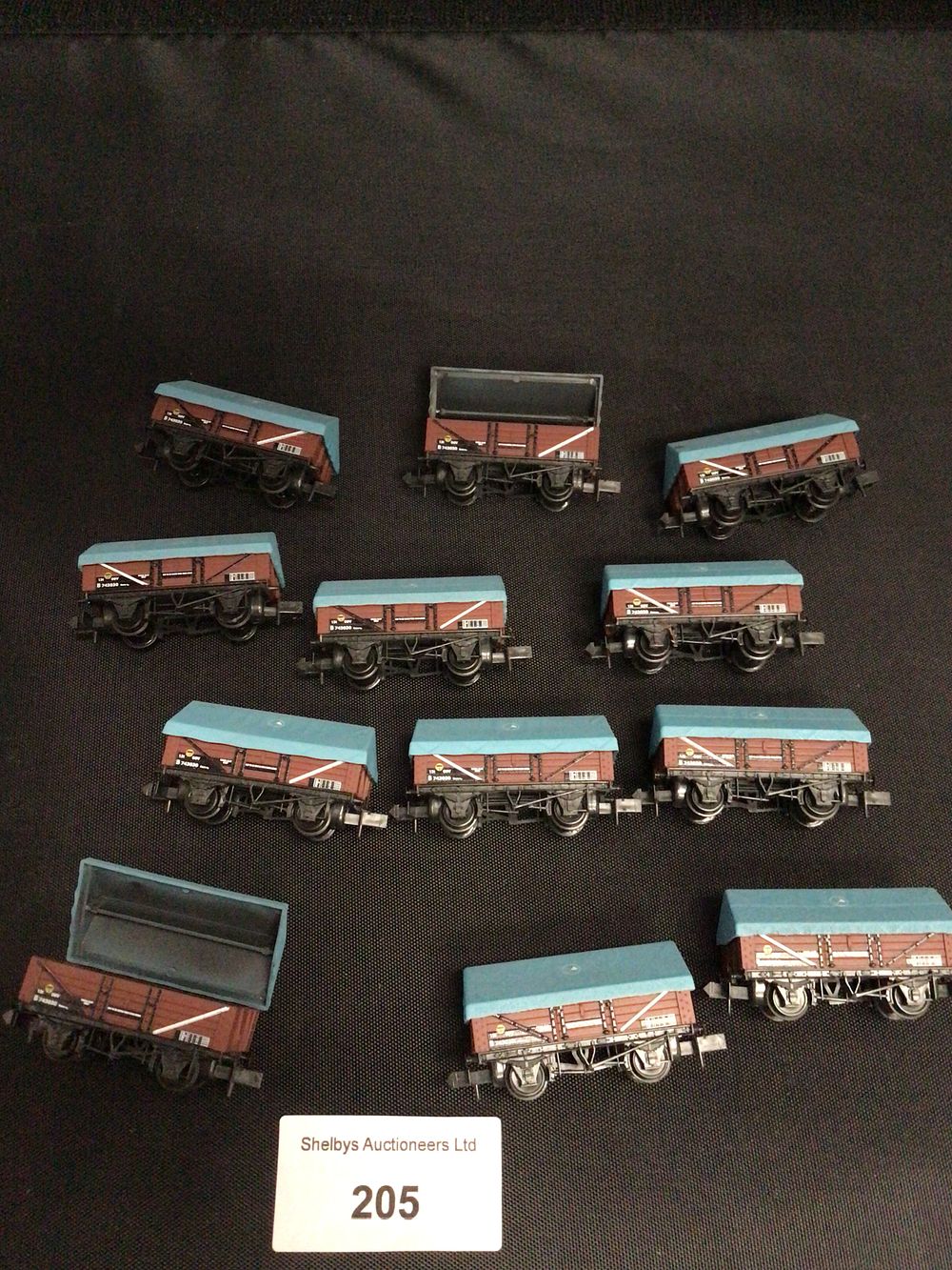 Lot 205: 12 Peco N gauge clay wagons