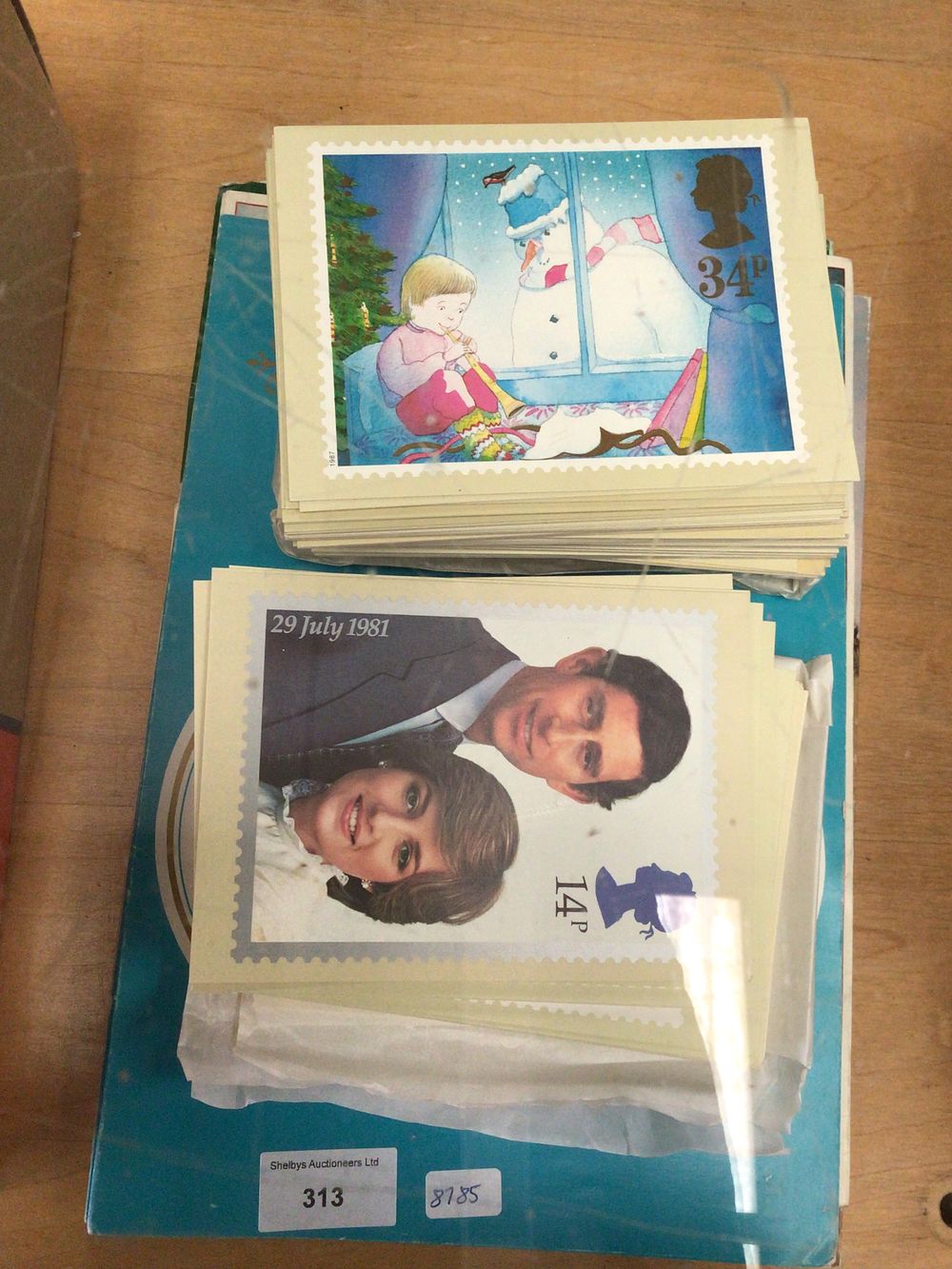 Lot 313: Large amount of stamp postcards with cigarette card posters