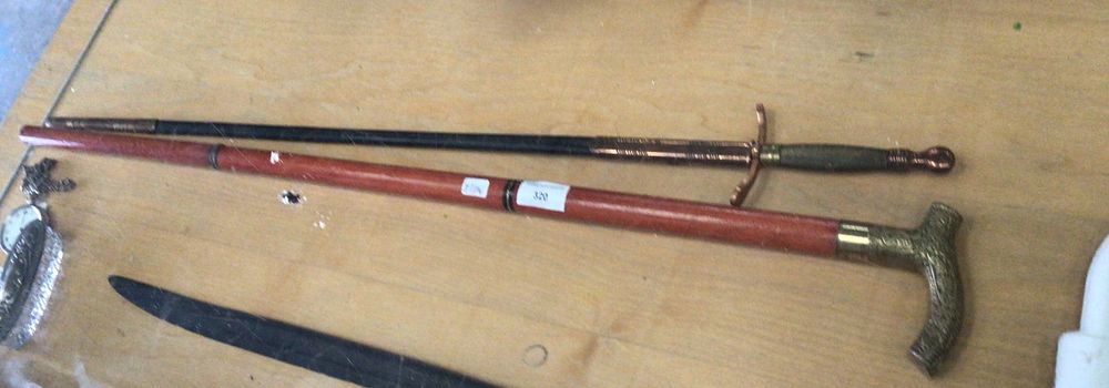 Lot 320: Wooden brass, topped walking stick