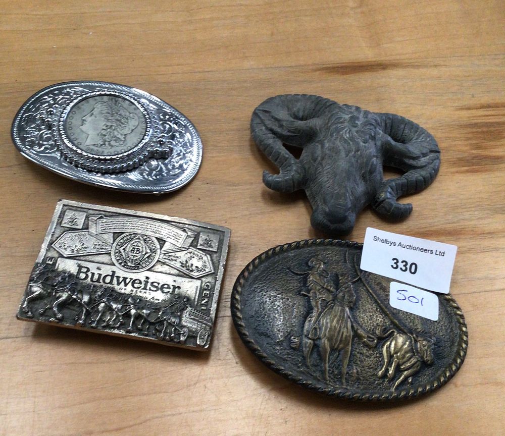 Lot 330: Four various design belt buckles