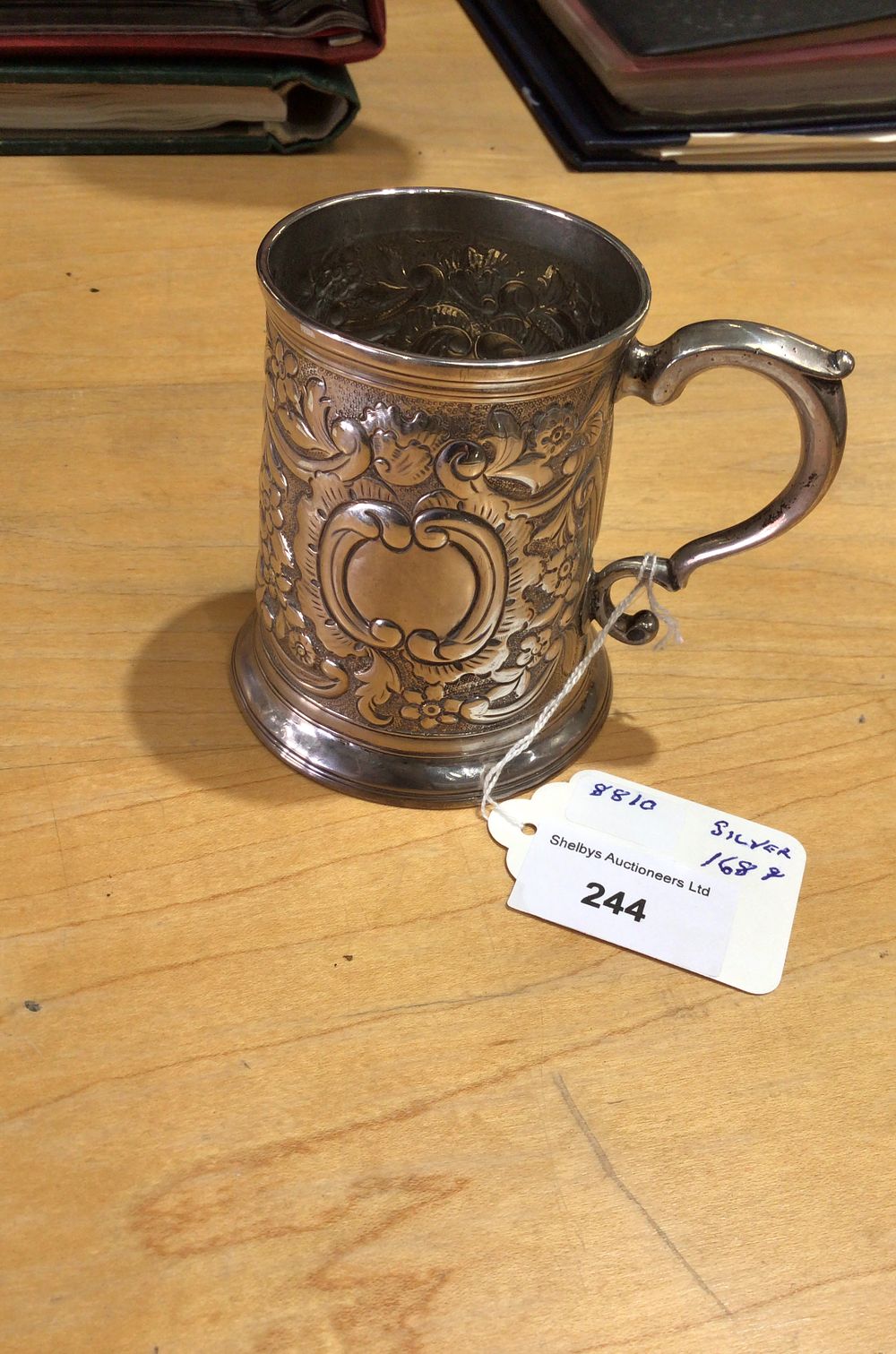 Lot 244: Antique Ornate Silver Mug