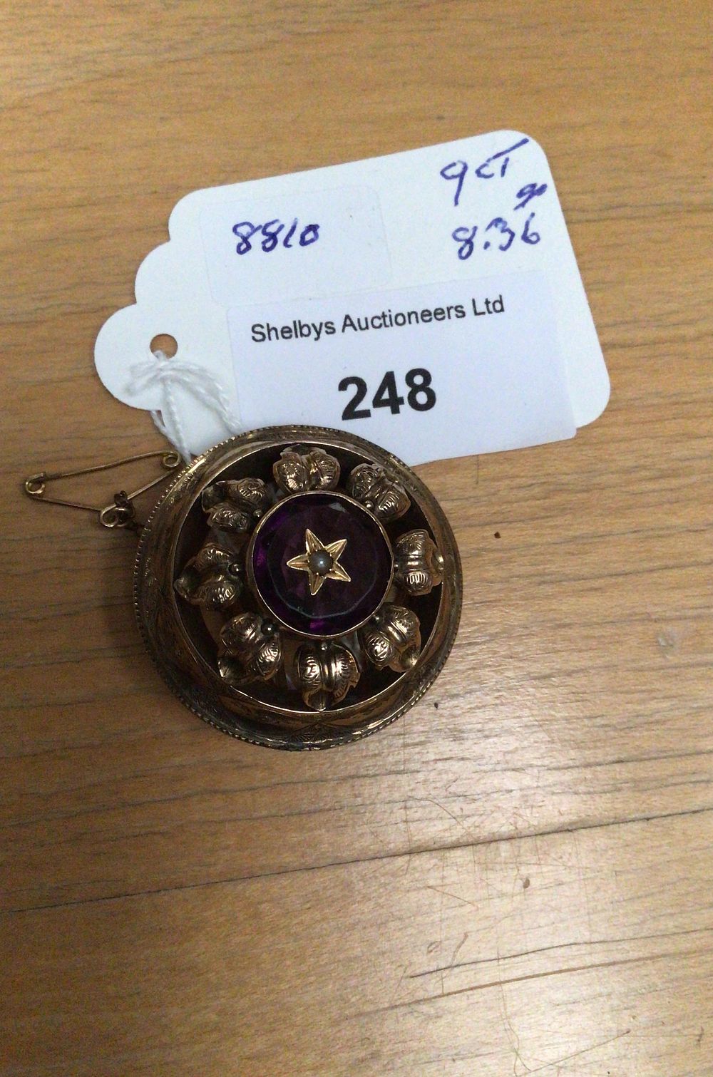Lot 248: Victorian 9ct Gold Purple Stone Starburst Brooch