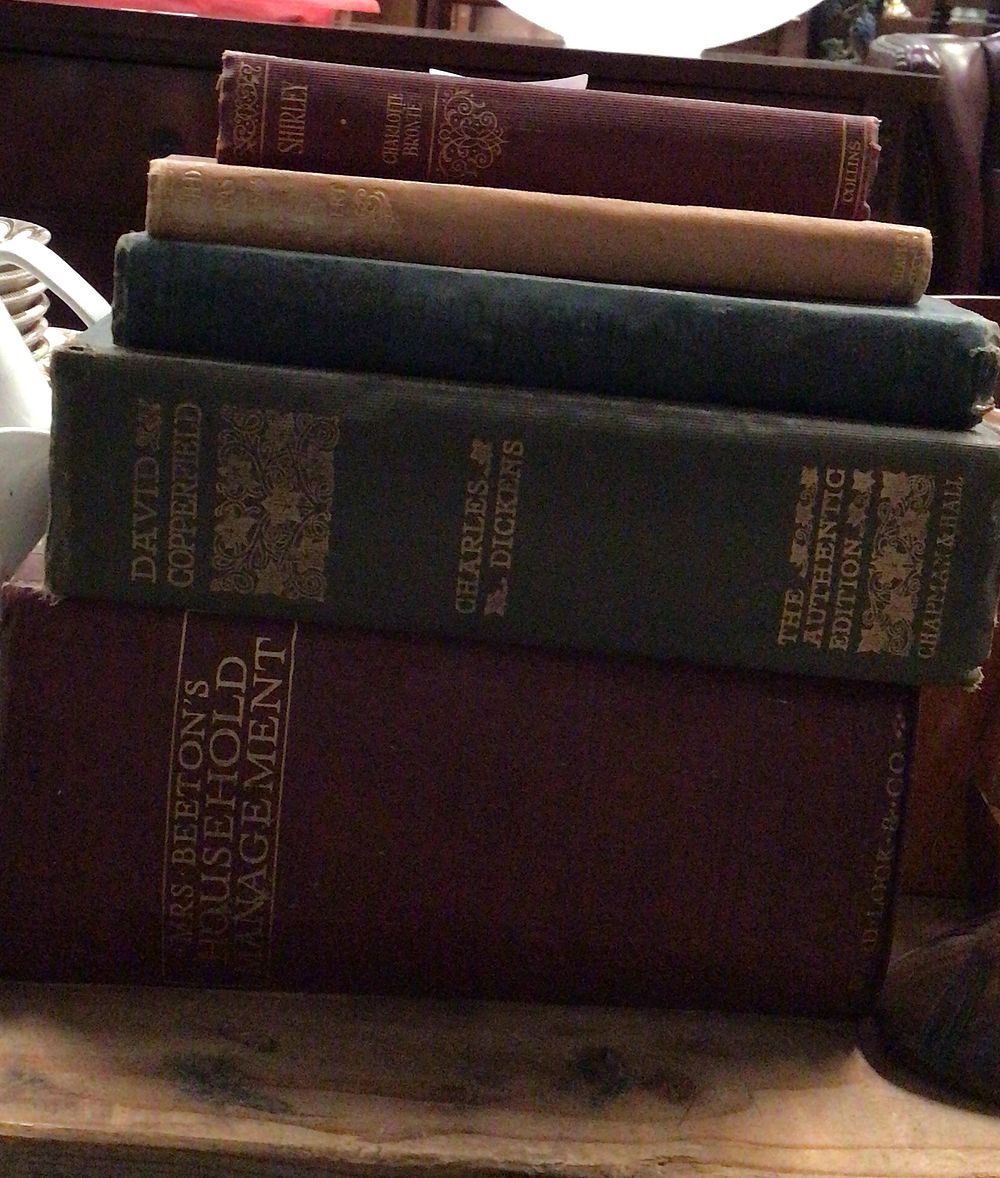 Lot 298: Stack of Predominantly Dark Red Books