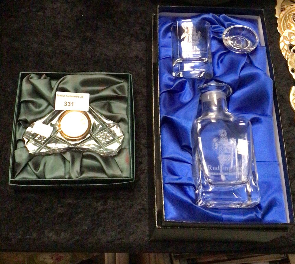 Lot 331: Rudding Park miniture decanter set with desk clock