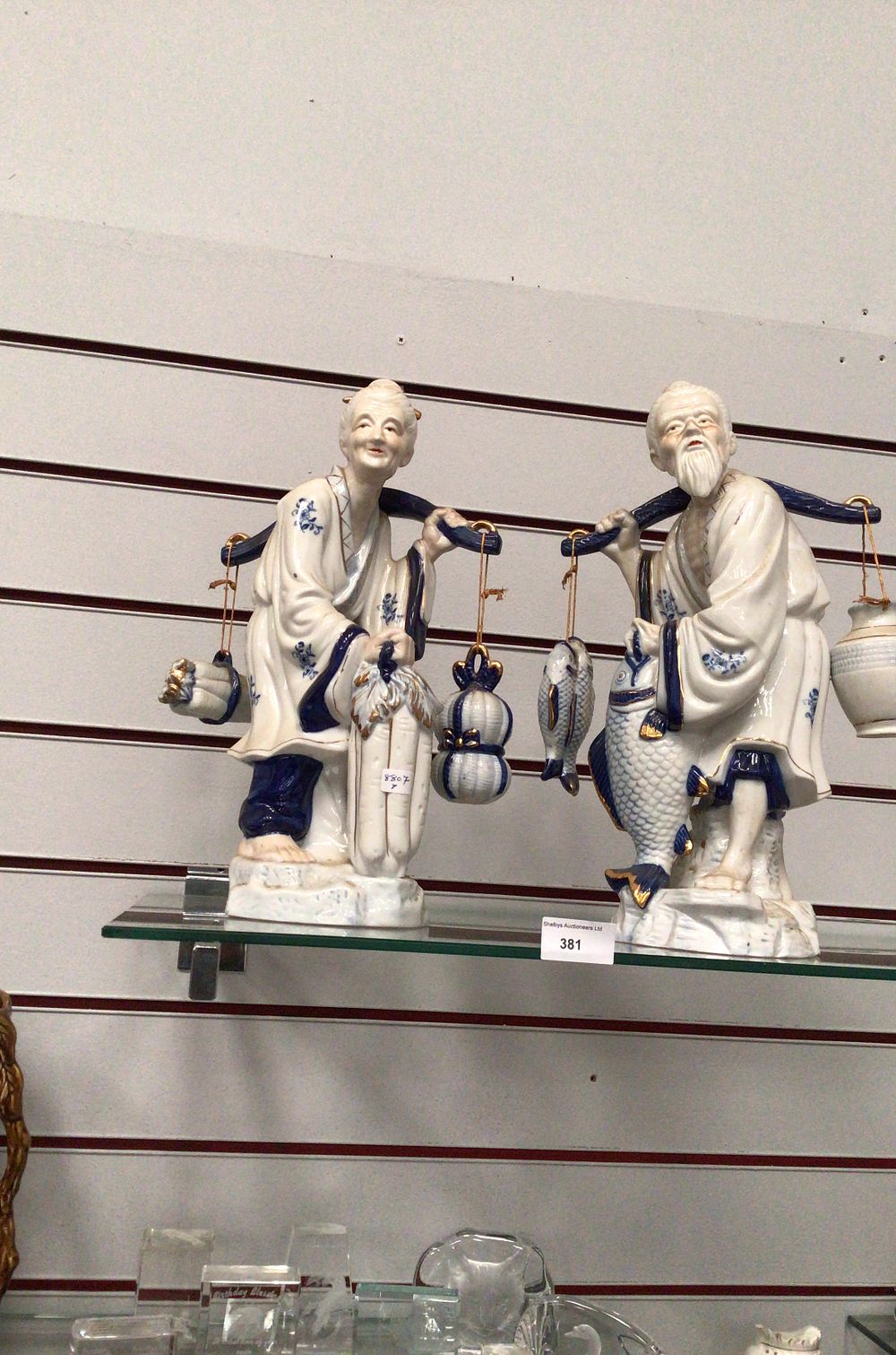 Lot 381: Pair of Chinese Blue and White Porcelain Figurines