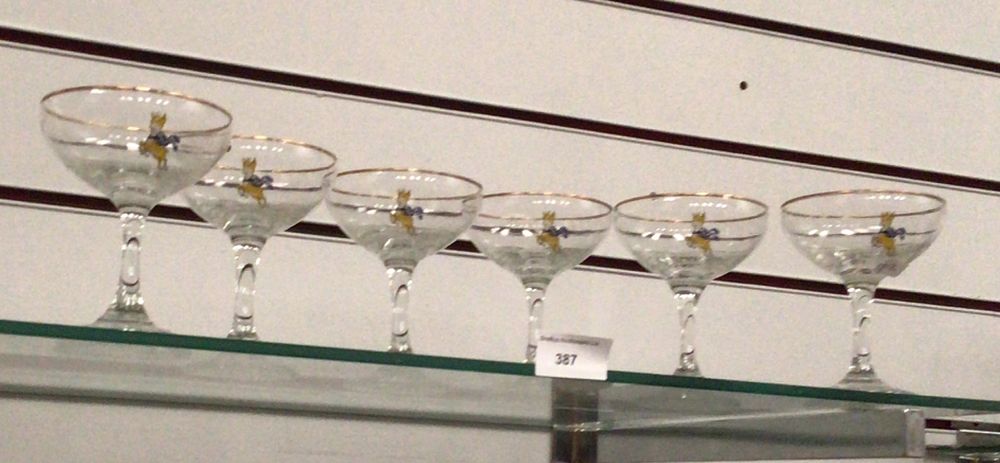 Lot 387: A Set of Six Babycham Glasses