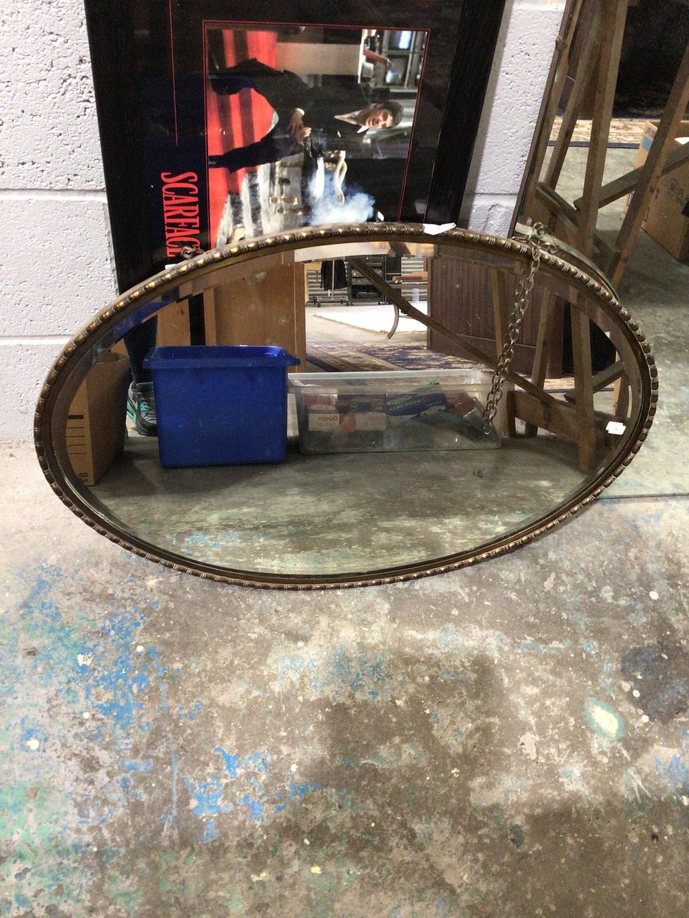 Lot 163: 1930s bevelled edged metal framed wall mirror oval shape, oval shape