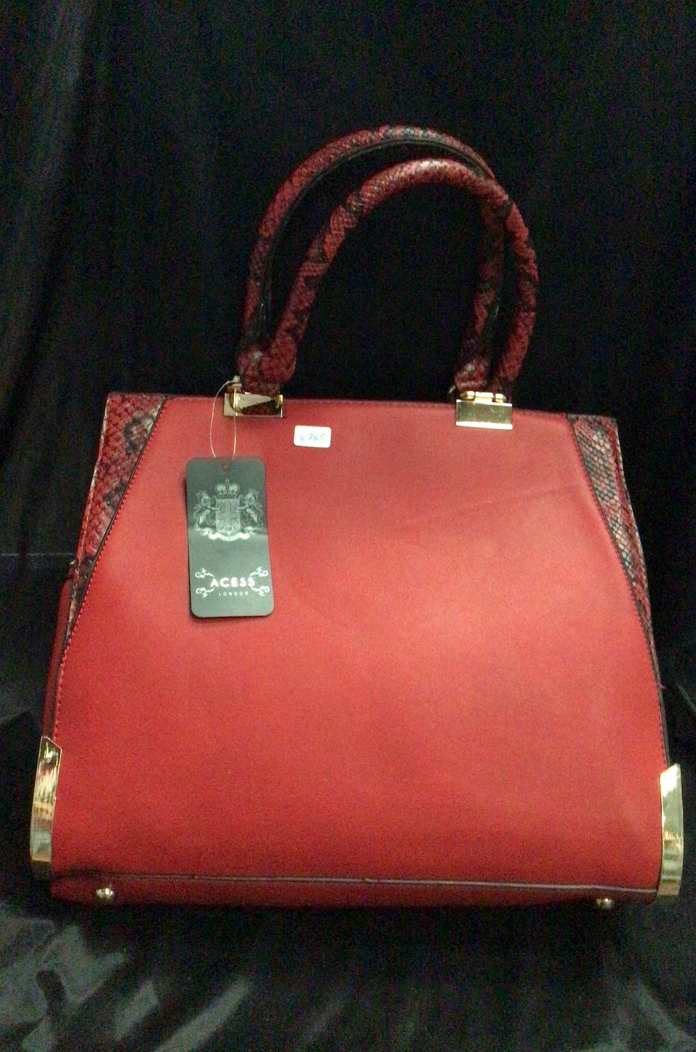 Lot 189: Red Structured Handbag with Braided Handles