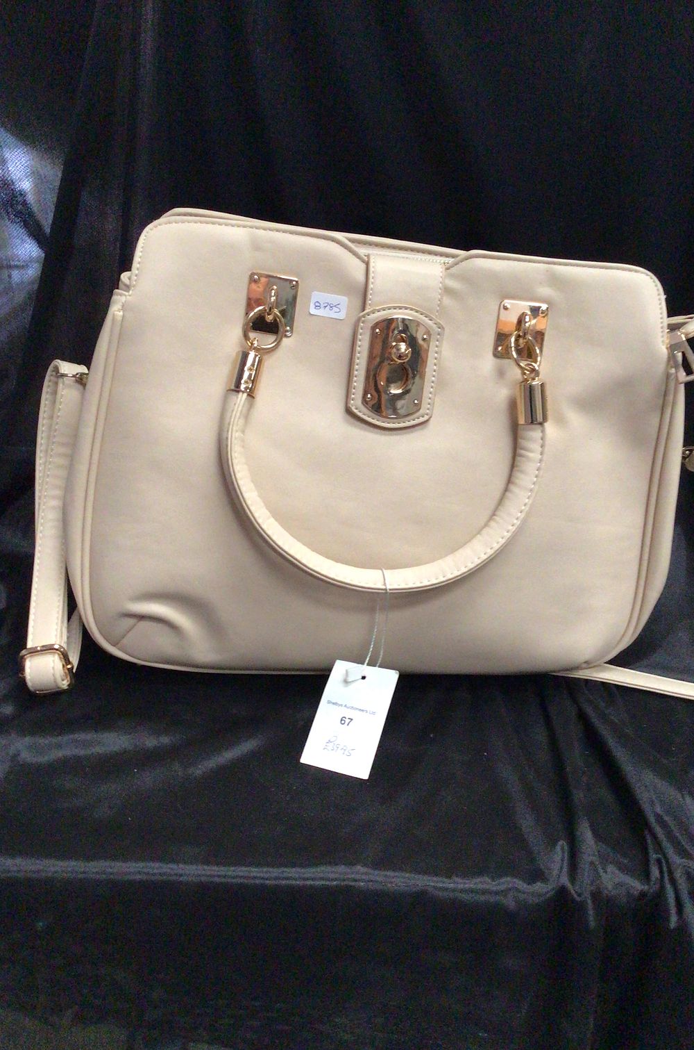 Lot 192: Structured Beige Handbag with Gold-Tone Hardware