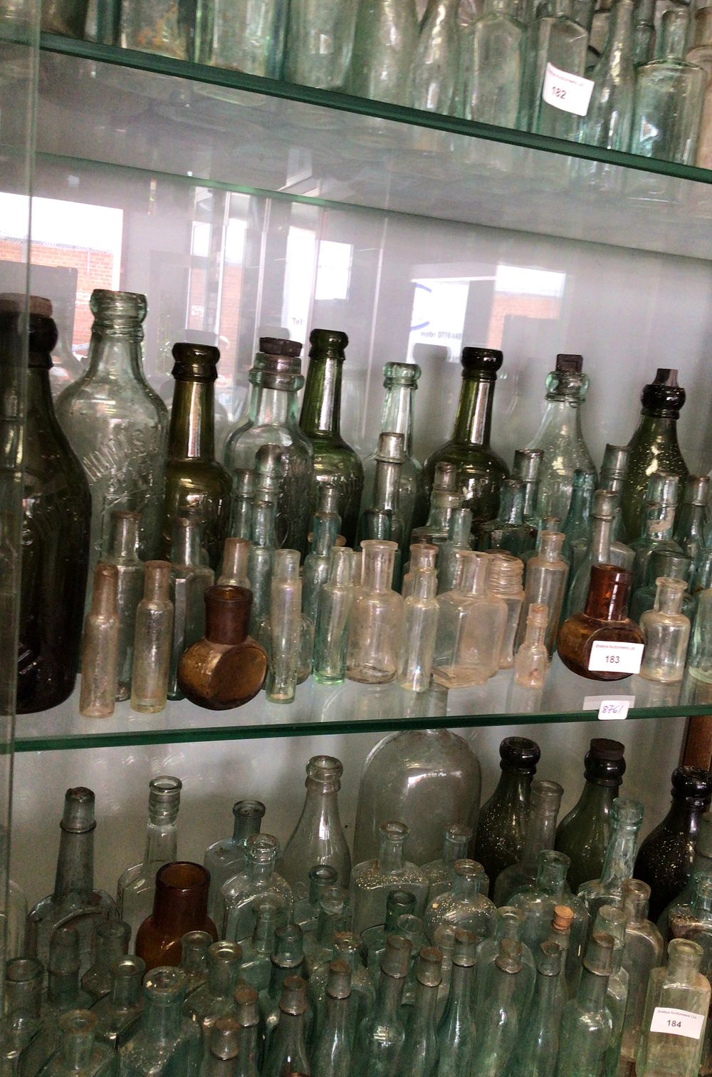 Lot 293: Collection of Antique and Vintage Glass Bottles