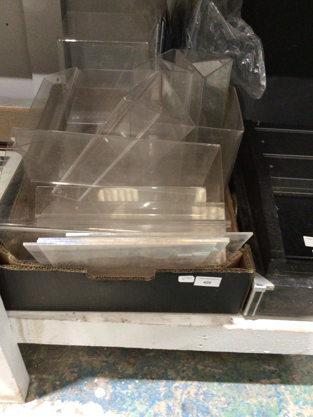 Lot 375: Box containing various plastic display stands