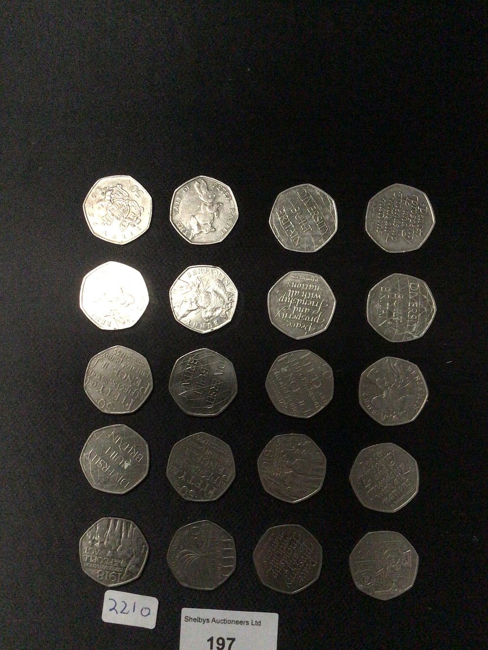 Lot 197: A Group of  Twenty Various Commemorative 50p Coins
