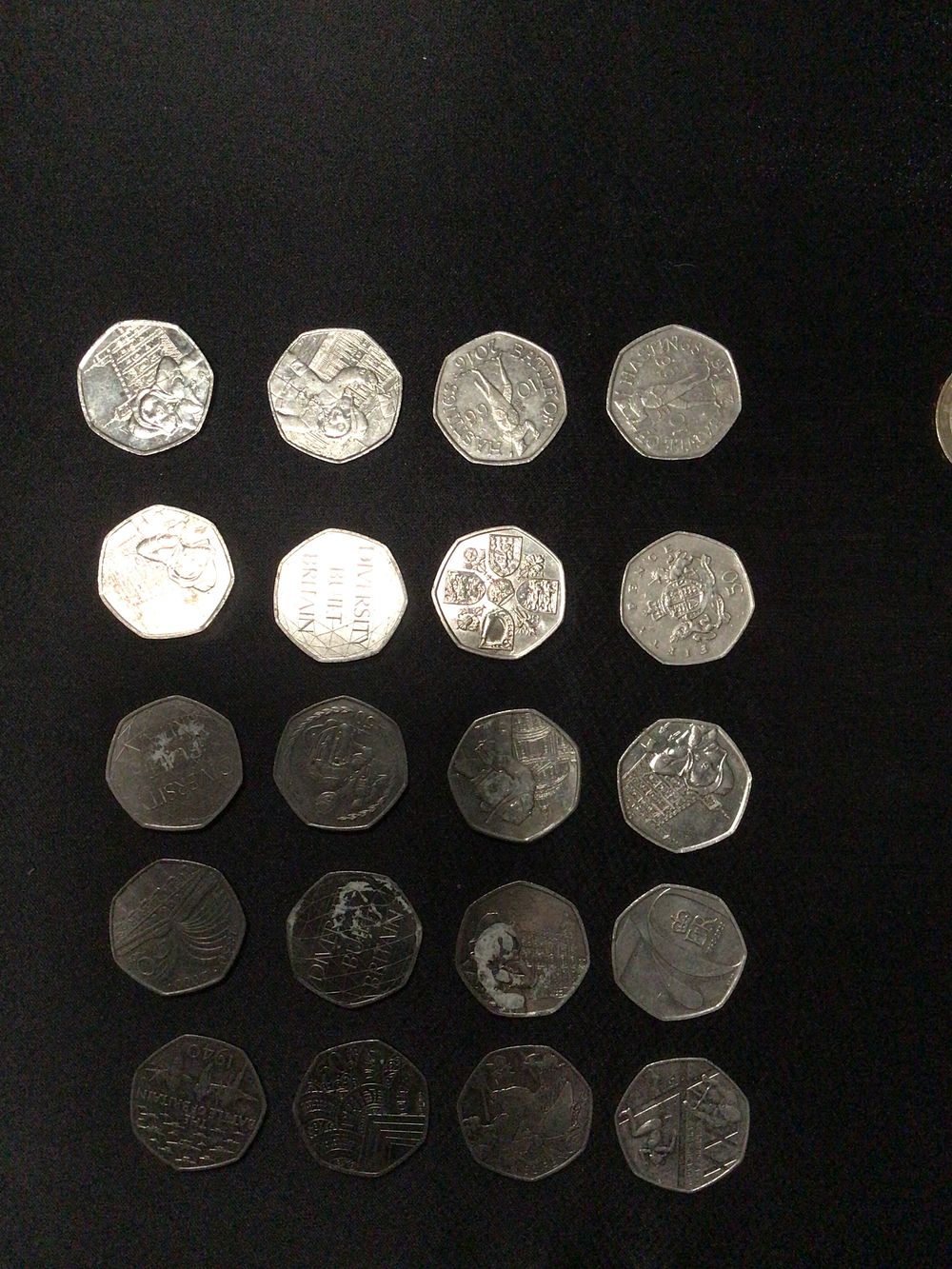 Lot 202: A Group of twenty  British 50 Pence Commemorative Coins
