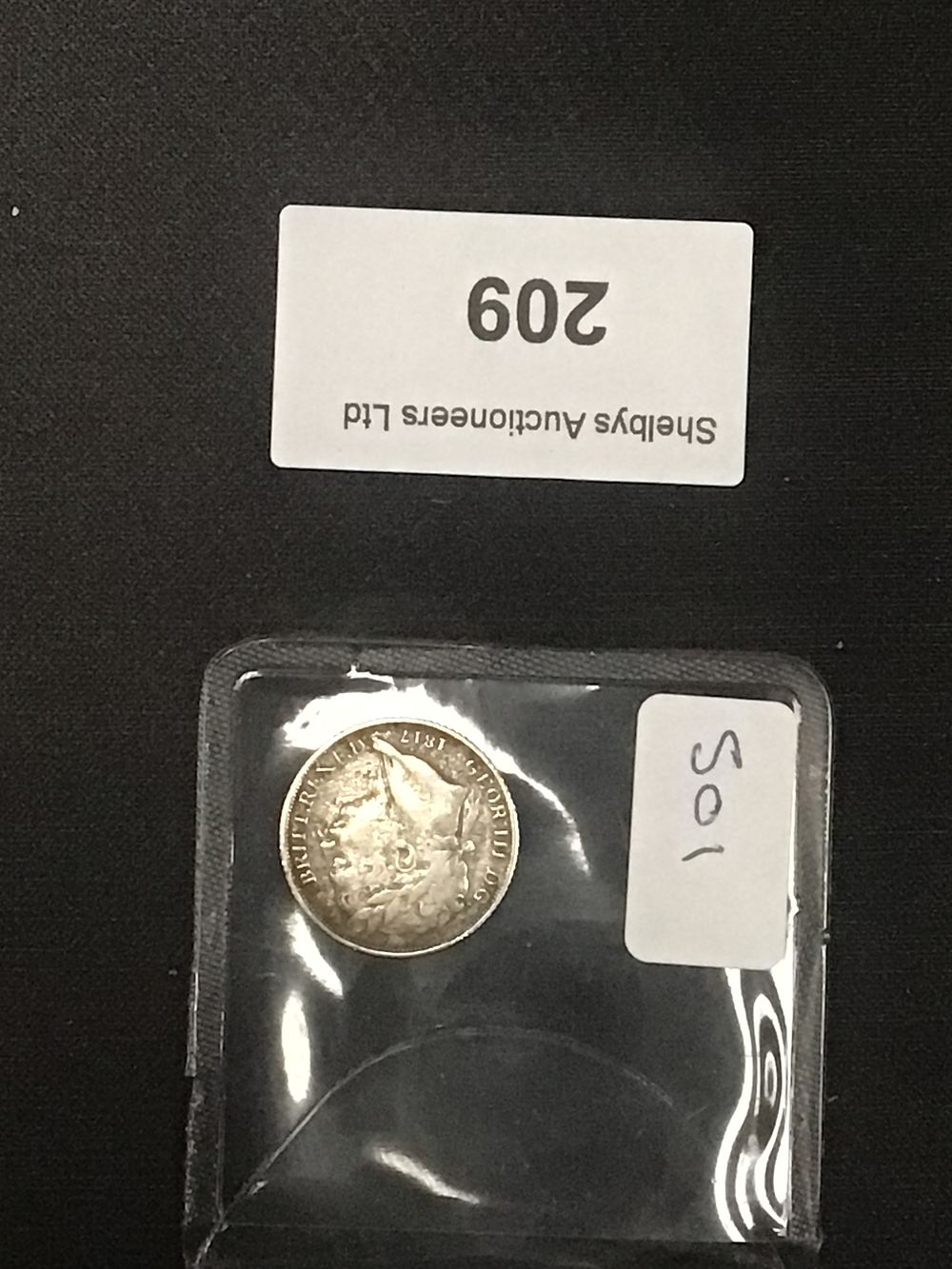 Lot 209: A George III Silver Coin, Dated 1817