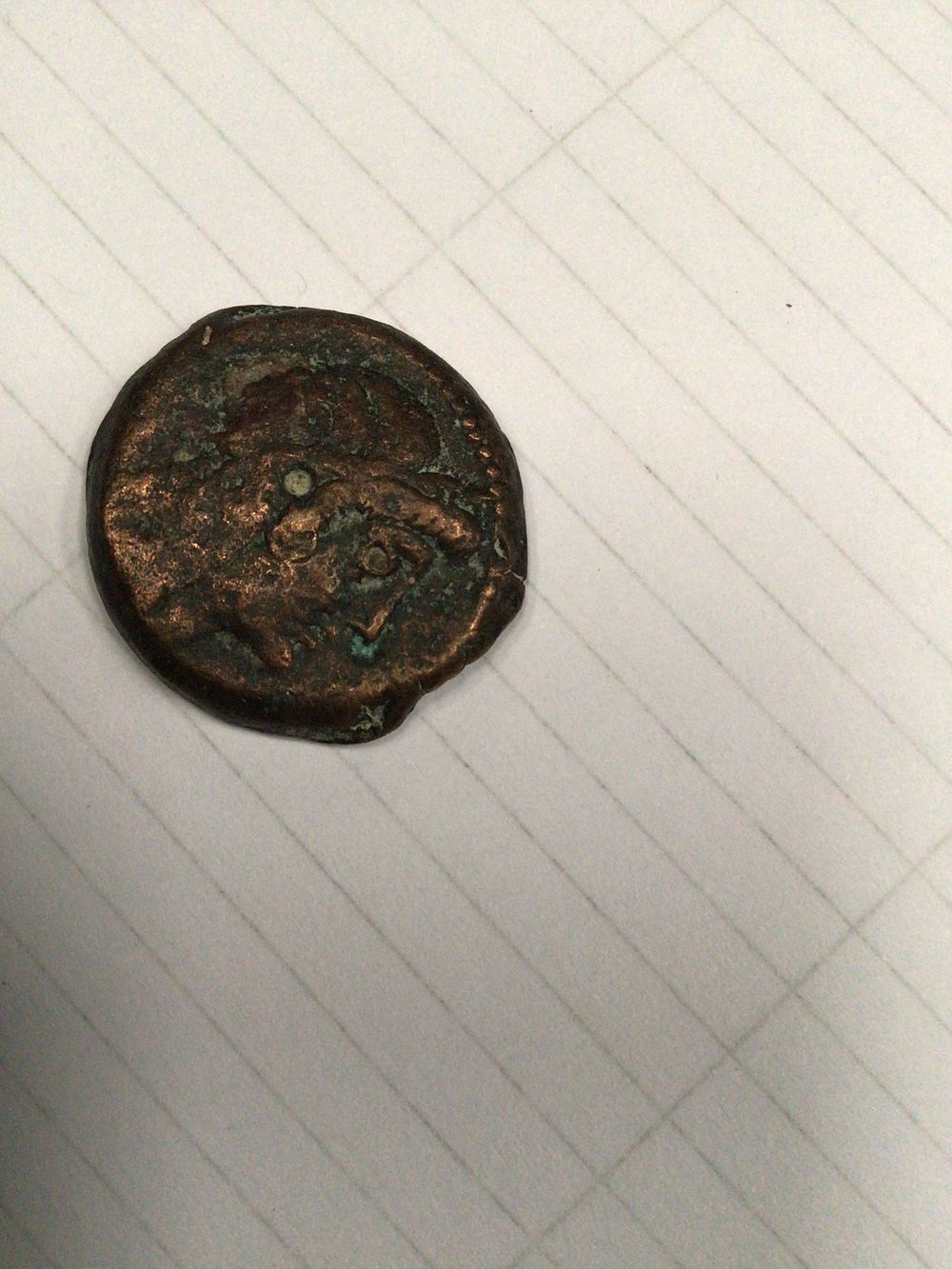 Lot 211: An Ancient Bronze or Copper Alloy Coin