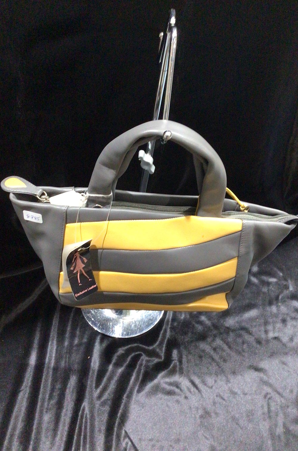 Lot 165: Gray and Yellow Striped Leather Handbag