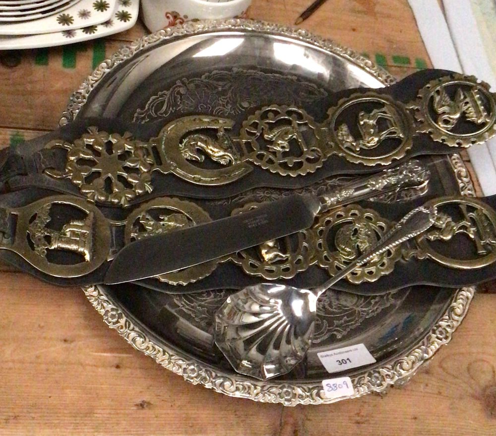 Lot 316: A Group of Silver-Colored Serving Items and Horse Brasses on Straps