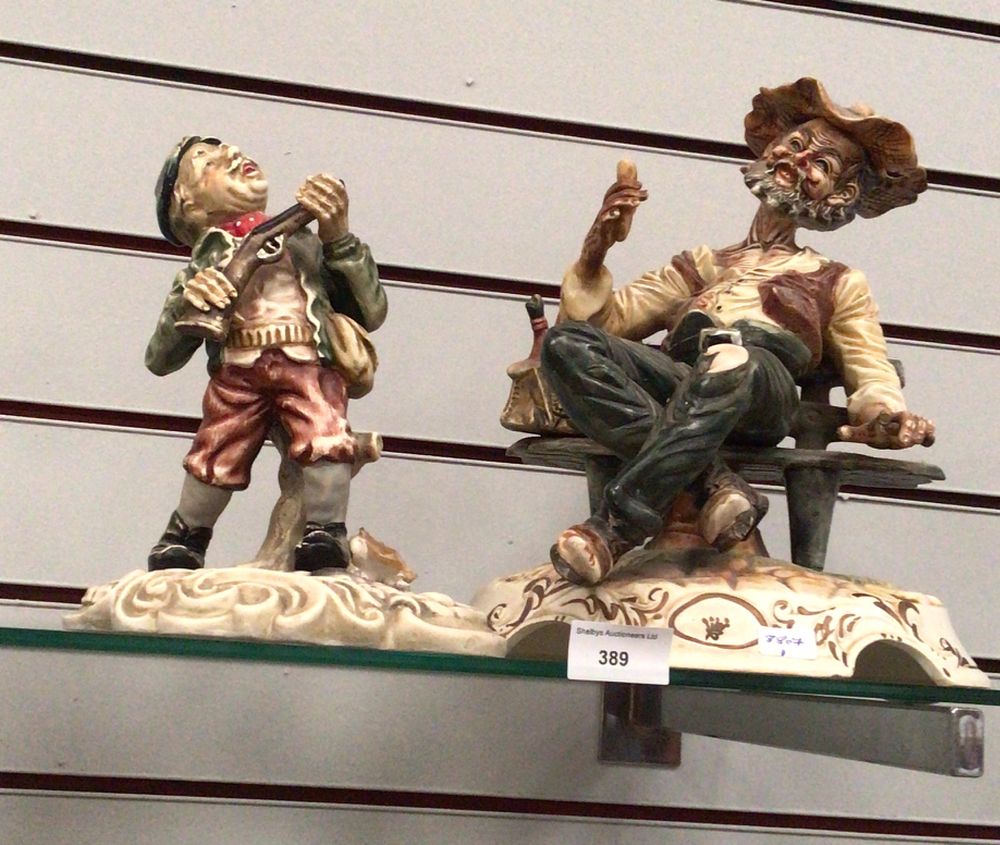 Lot 269: A Pair of Capodimonte Hobo Figurines