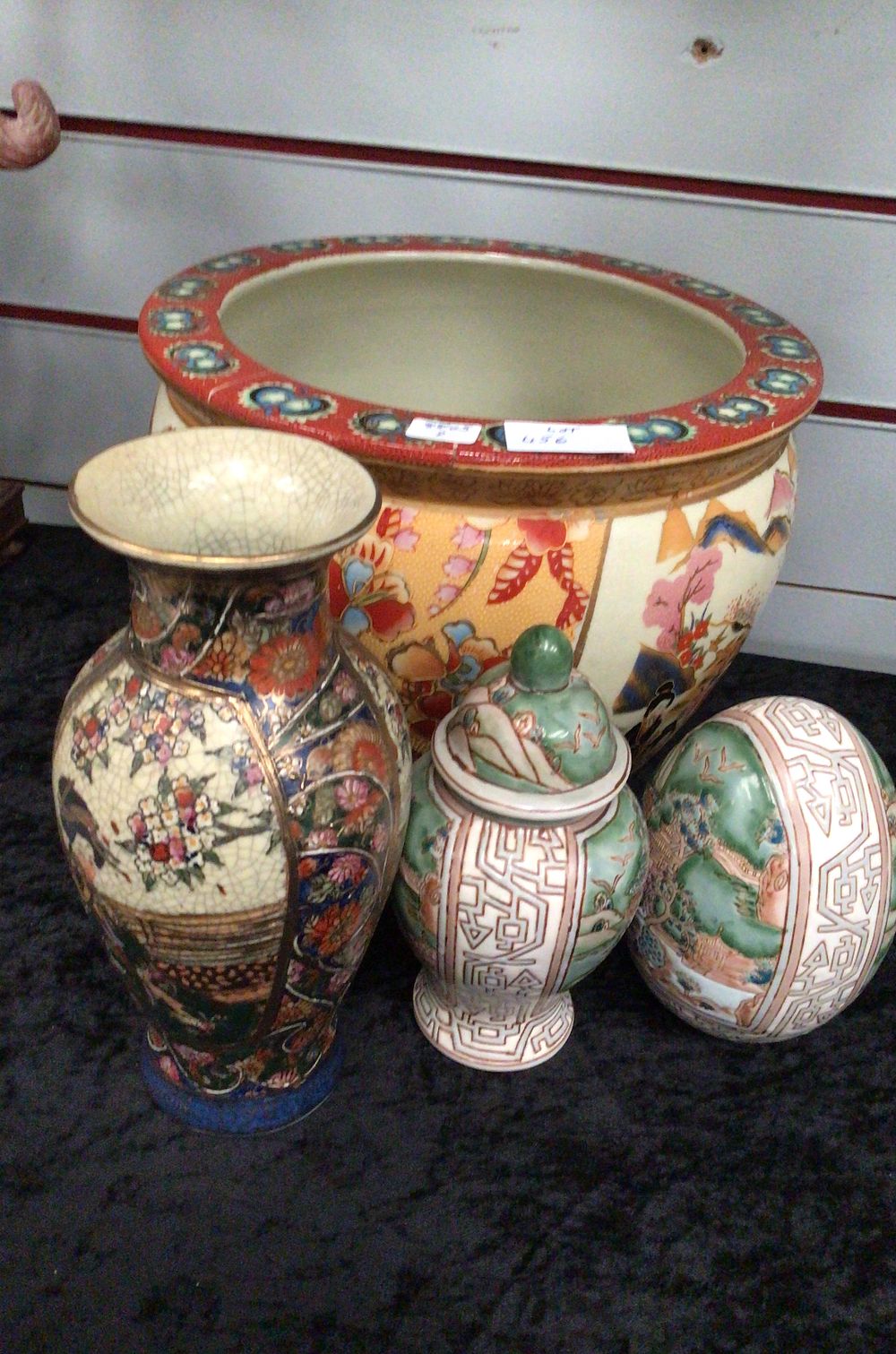 Lot 279: A Large Multi-Colored Ceramic Planter with cloisonne vase