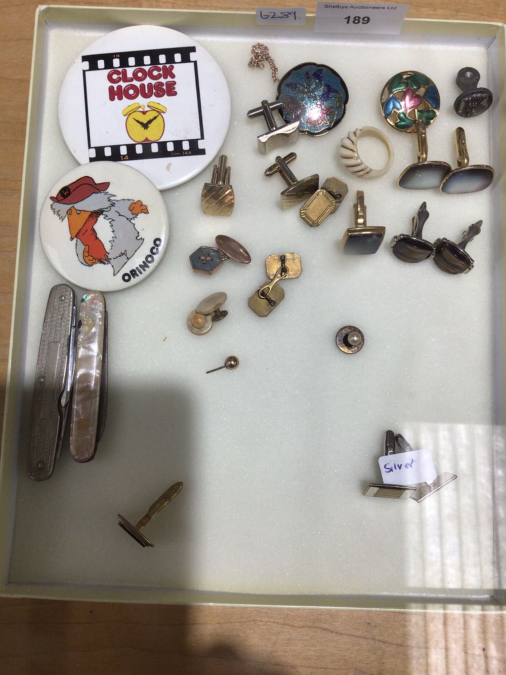 Lot 189: A Group of Pins, Cufflinks, and Assorted Collectibles