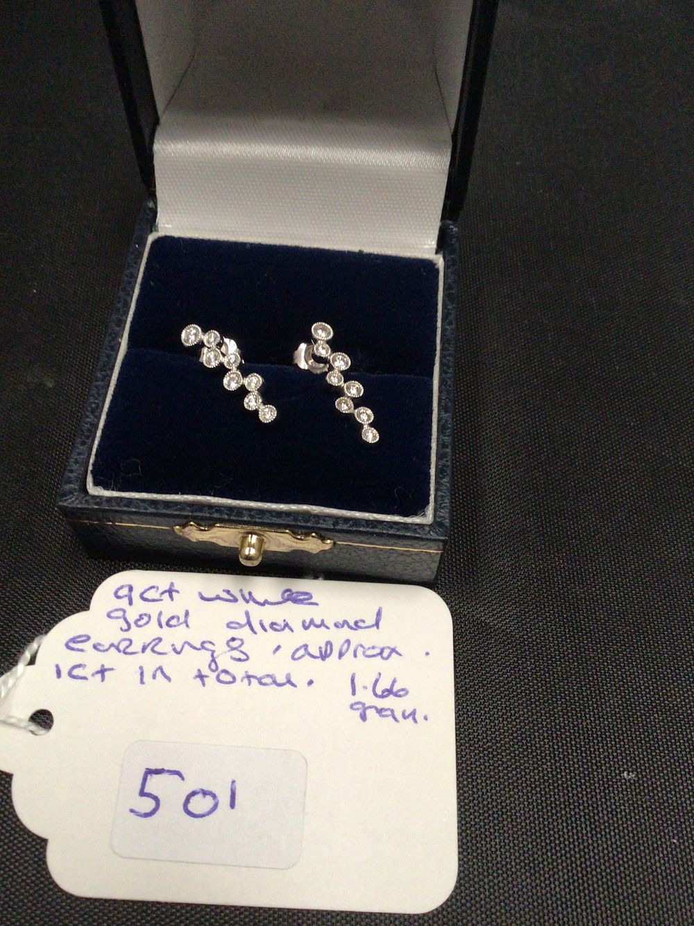Lot 230: A Pair of 9ct White Gold Diamond Earrings