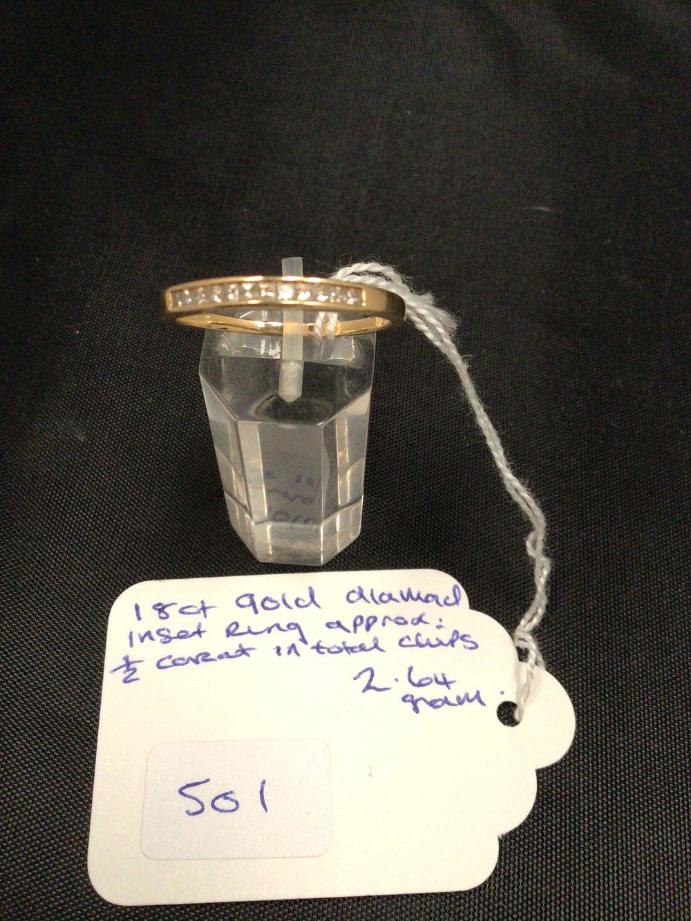 Lot 235: An 18ct Gold Diamond Insert Ring