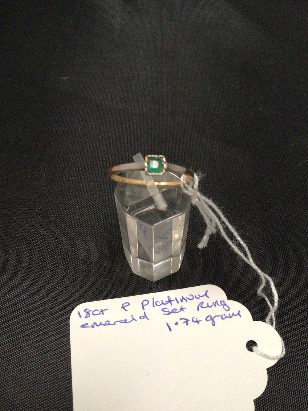 Lot 238: Art Deco 18ct Gold and Platinum Square Emerald Ring