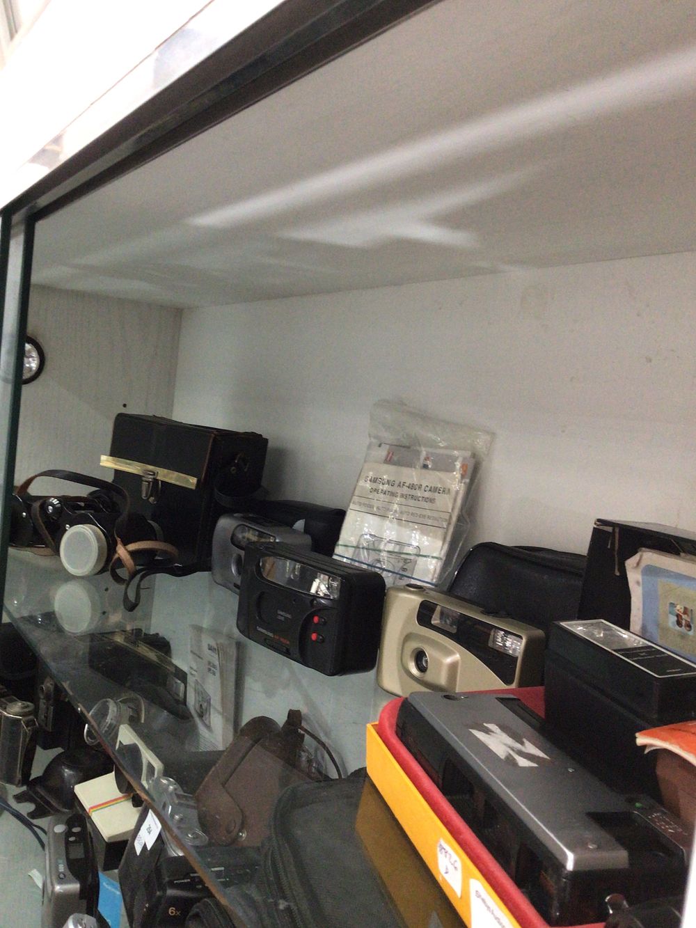 Lot 263: A Black Video Camera and various cameras