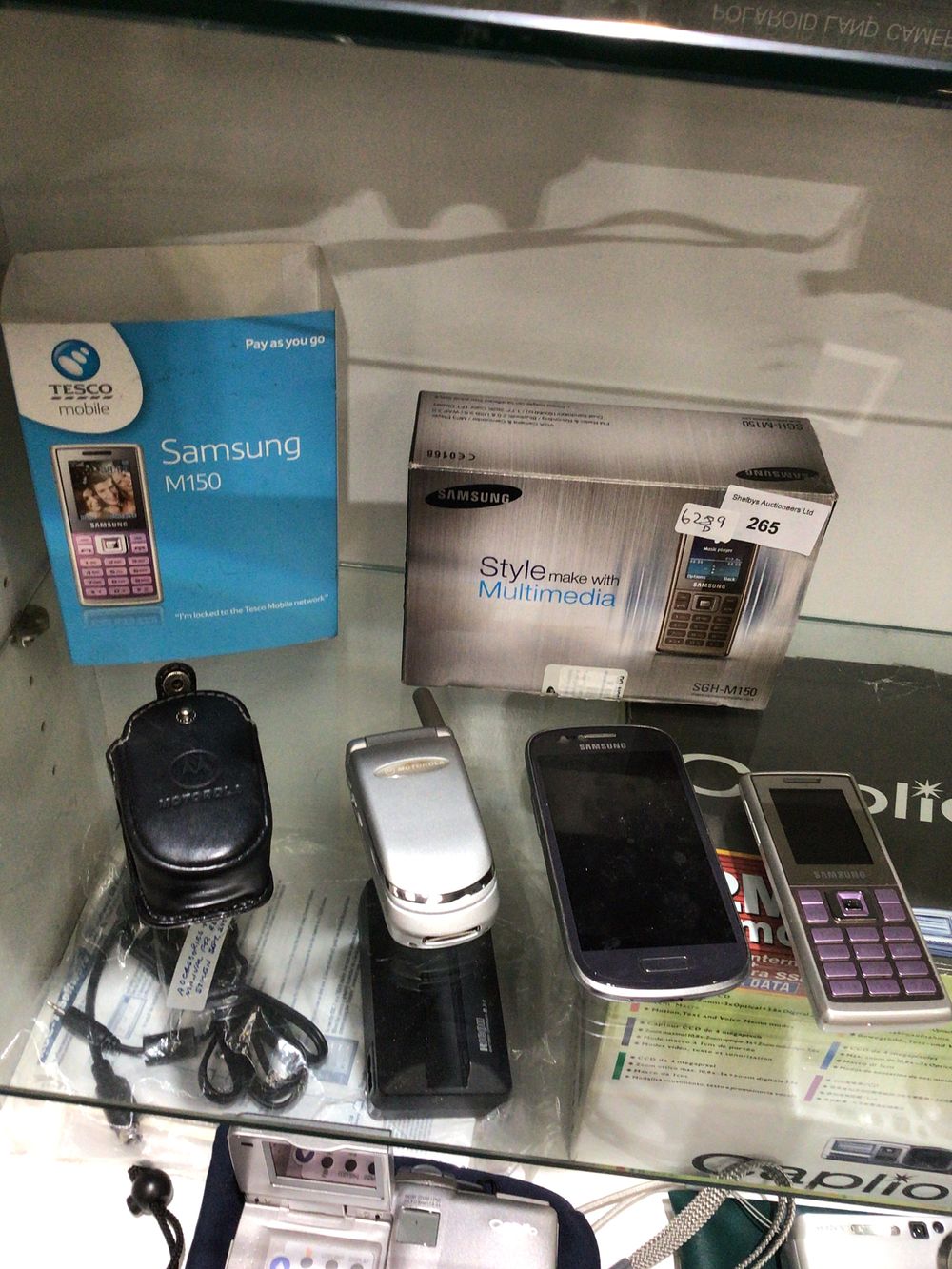 Lot 265: Samsung SGH-M150 Boxed Mobile Phone and various other phones