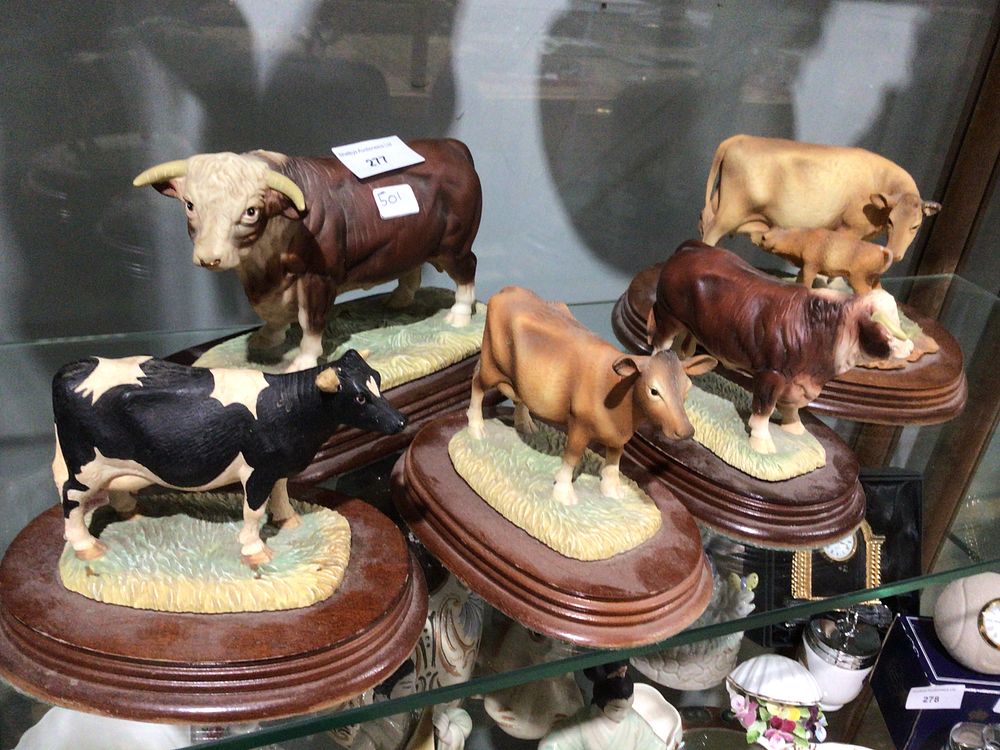 Lot 277: A Group of Five Leonardo Collection Cattle Figurines