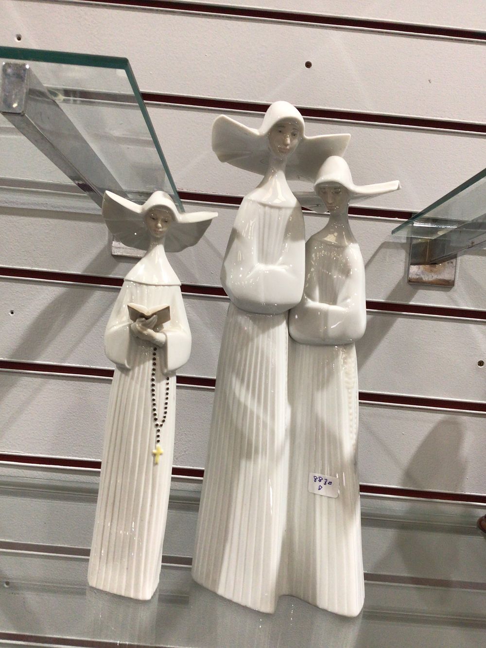 Lot 342: Three Lladro Porcelain Nun Figurines