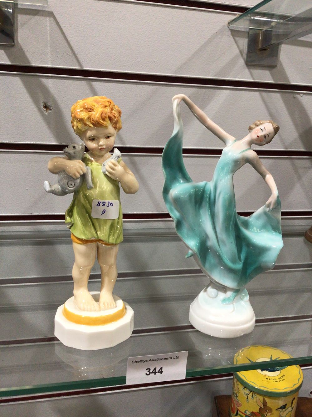 Lot 344: A Ceramic Figurine of a Female Dancer With Royal Worcester Wednesdays child figure
